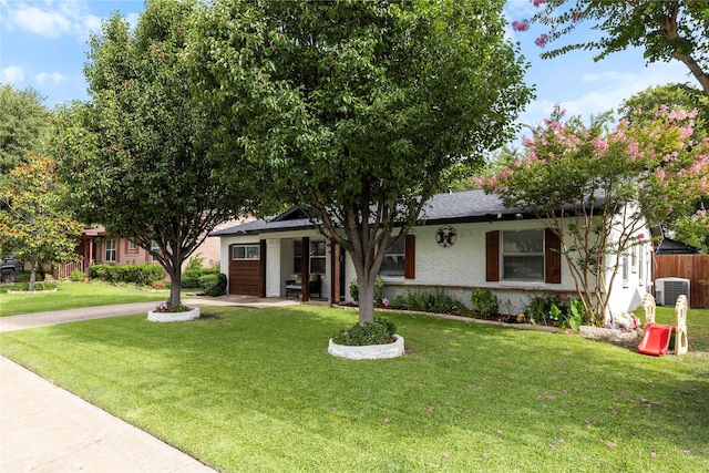 4109 Timberline Dr, Garland, TX 75042 - view of front facade featuring brick siding and covered porch