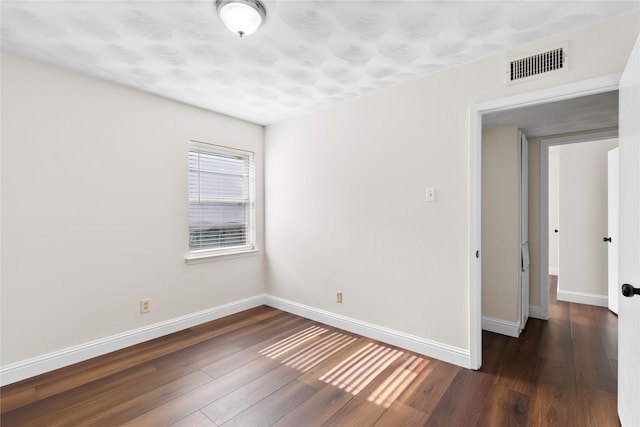 4109 Timberline Dr, Garland, TX 75042 - spare room featuring wood-type flooring