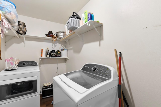 4109 Timberline Dr, Garland, TX 75042 - laundry room with washing machine and clothes dryer and dark wood-style floors