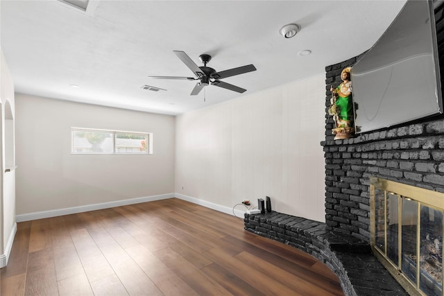4109 Timberline Dr, Garland, TX 75042 - unfurnished living room with a fireplace, ceiling fan, and wood finished floors