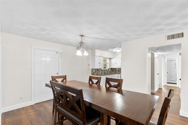 4109 Timberline Dr, Garland, TX 75042 - dining room with wood finished floors