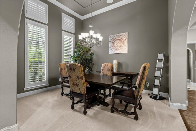429 S Hampton Ct, Lewisville, TX 75056 - carpeted dining area with ornamental molding, baseboards, and a notable chandelier