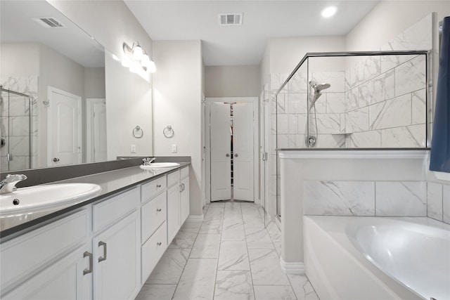 full bathroom with a sink, visible vents, a shower stall, and marble finish floor