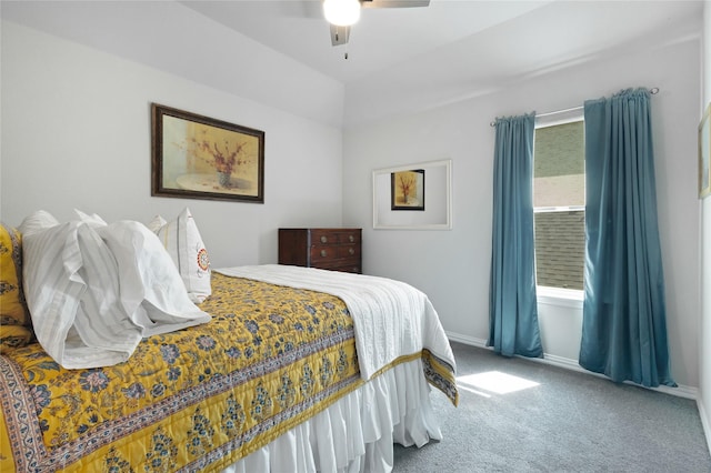 carpeted bedroom with baseboards and a ceiling fan