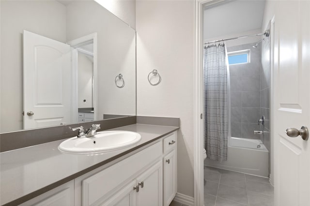 bathroom featuring toilet, tile patterned floors, vanity, and shower / tub combo with curtain