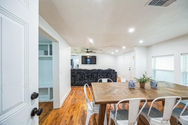 dining room featuring light wood-type flooring, baseboards, recessed lighting, visible vents, and ceiling fan