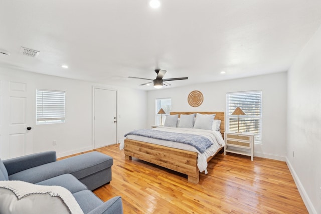 bedroom featuring visible vents, baseboards, recessed lighting, and light wood-style floors
