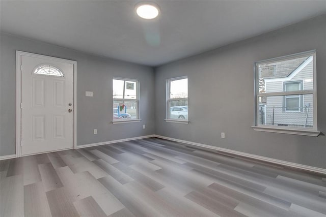 702 N Virginia, Terrell, TX 75160 - foyer entrance with baseboards and wood finished floors