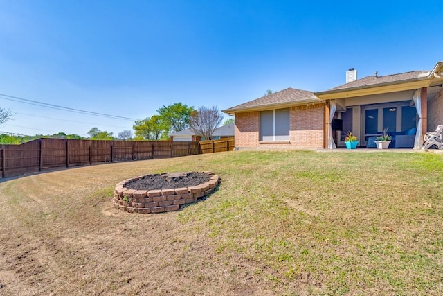 view of yard featuring a fenced backyard