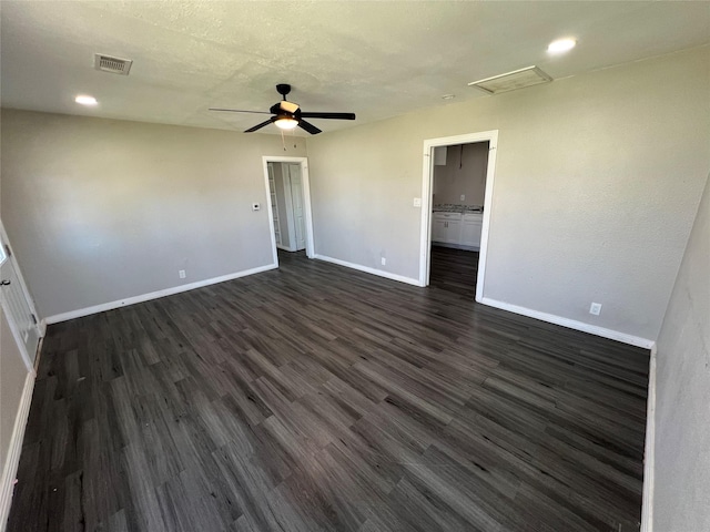 2912 W Elm St, Denison, TX 75020 - interior space featuring attic access, baseboards, and dark wood-style floors