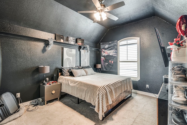 500 Lismore Dr, Mansfield, TX 76063 - carpeted bedroom with baseboards, ceiling fan, a textured wall, a textured ceiling, and vaulted ceiling