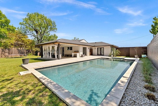 505 Heyser Dr, Dallas, TX 75224 - view of swimming pool with fence, french doors, a patio, a lawn, and a trampoline