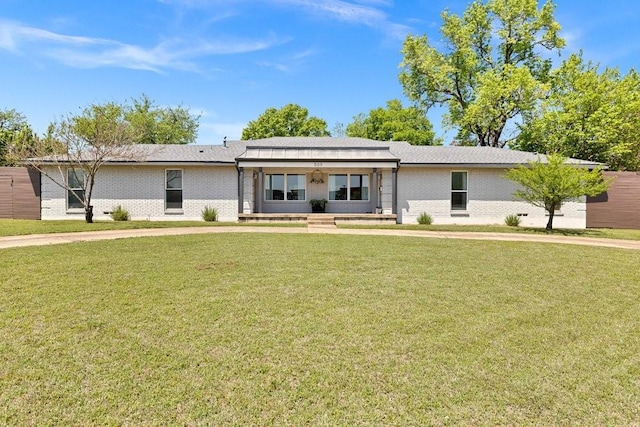 505 Heyser Dr, Dallas, TX 75224 - ranch-style house with brick siding and a front yard