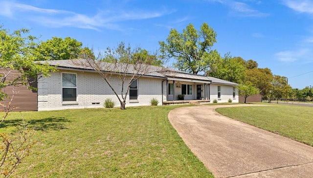 505 Heyser Dr, Dallas, TX 75224 - single story home featuring brick siding, a porch, driveway, and a front yard