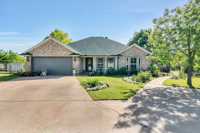 105 Park Trail Pl, Joshua, TX 76058 - view of front facade with concrete driveway, an attached garage, brick siding, a gate, and covered porch