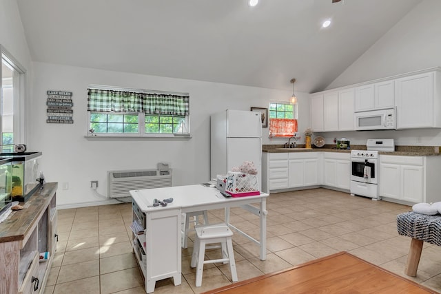 105 Park Trail Pl, Joshua, TX 76058 - kitchen with white appliances, a sink, vaulted ceiling, light tile patterned flooring, and white cabinets