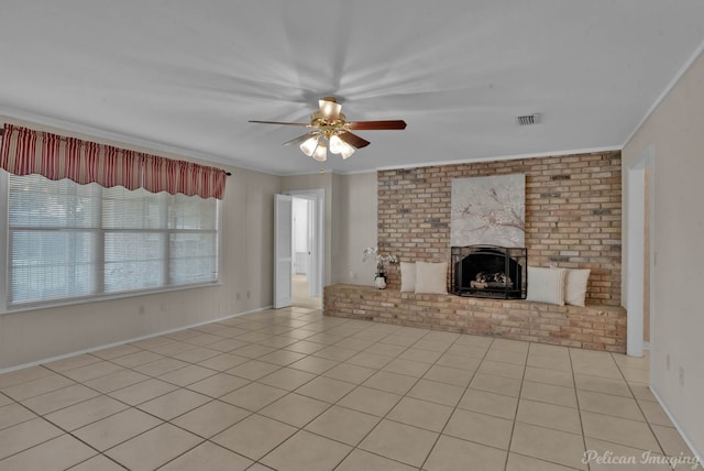7321 Montclair Dr, Shreveport, LA 71105 - unfurnished living room featuring ornamental molding, a ceiling fan, tile patterned flooring, and a brick fireplace