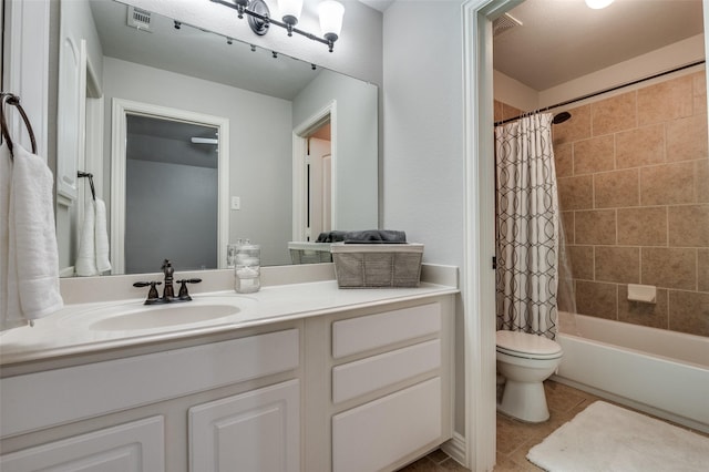 bathroom featuring tile patterned flooring, visible vents, toilet, vanity, and shower / tub combo