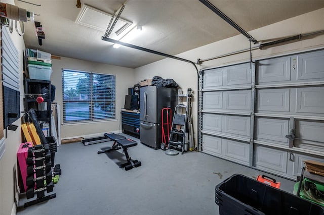 garage featuring freestanding refrigerator