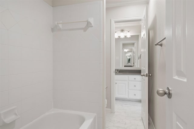 full bathroom featuring toilet, marble finish floor, shower / washtub combination, and vanity