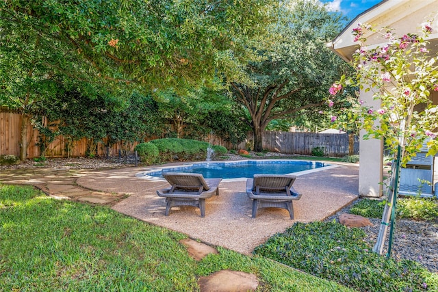 view of pool featuring a fenced backyard, a fenced in pool, and a patio area