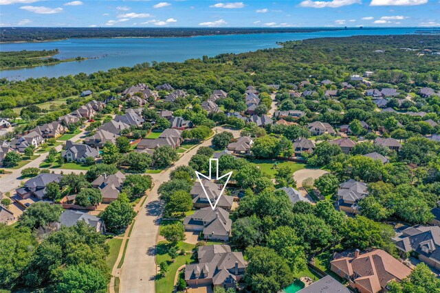 bird's eye view with a water view and a residential view