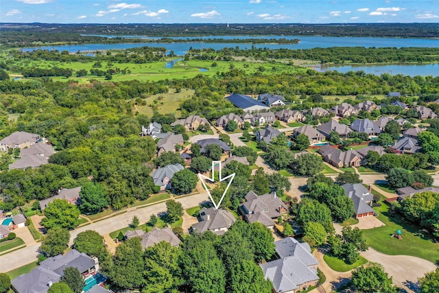 aerial view with a residential view and a water view