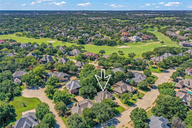 drone / aerial view with a residential view and view of golf course