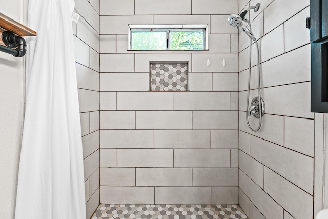 bathroom featuring a stall shower