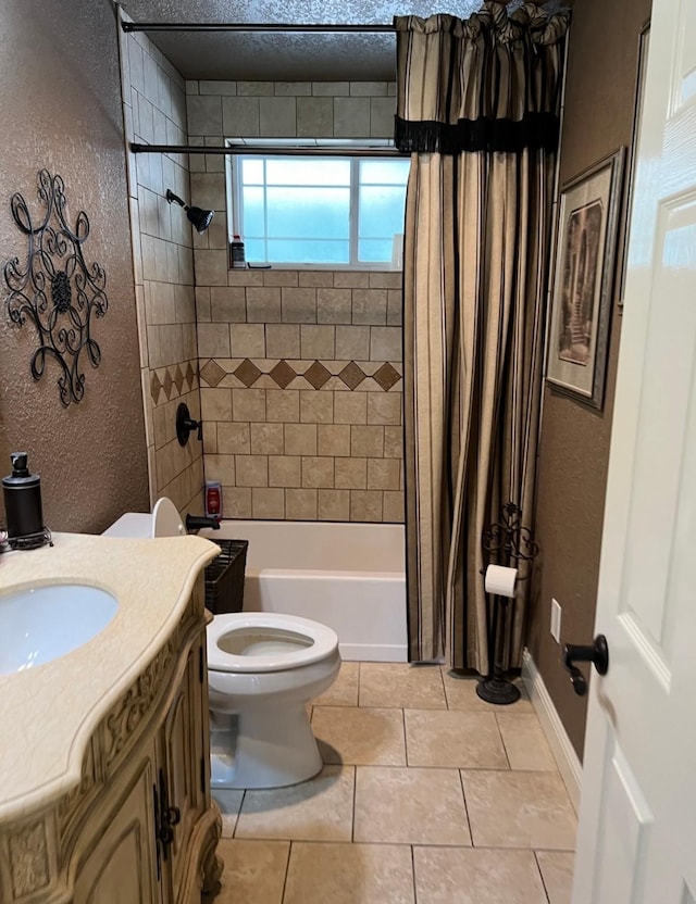 full bathroom with a textured wall, tile patterned floors, shower / tub combo, and toilet