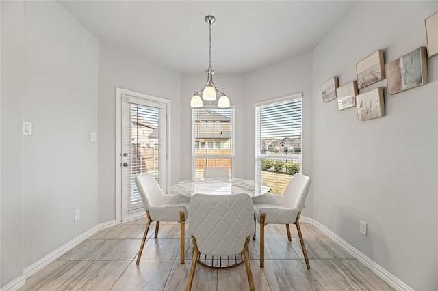 1036 Rutherford St, Frisco, TX 75036 - dining space featuring light wood-style floors and baseboards