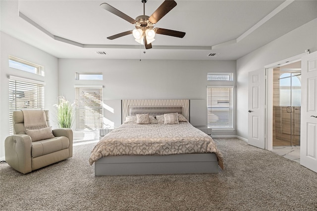 1036 Rutherford St, Frisco, TX 75036 - carpeted bedroom featuring a tray ceiling, visible vents, and baseboards
