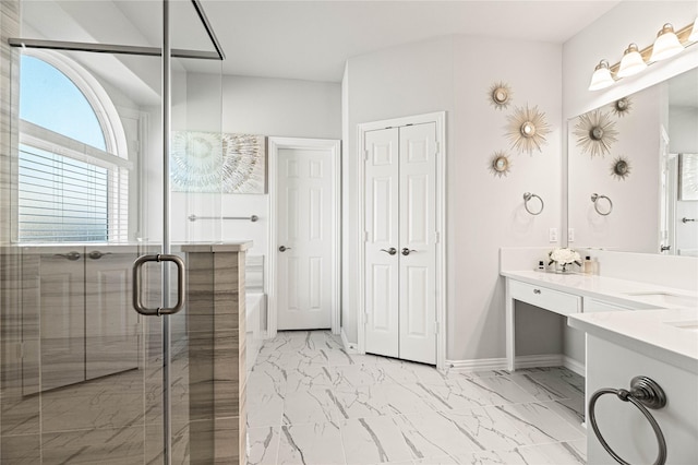 1036 Rutherford St, Frisco, TX 75036 - bathroom featuring baseboards, marble finish floor, a bath, a shower stall, and vanity