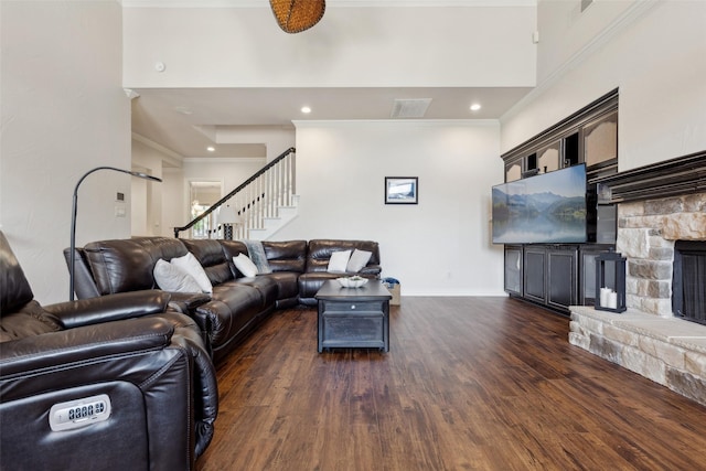 5205 Coral Springs Dr, Flower Mound, TX 75022 - living room with dark wood-type flooring, ornamental molding, recessed lighting, baseboards, and stairway