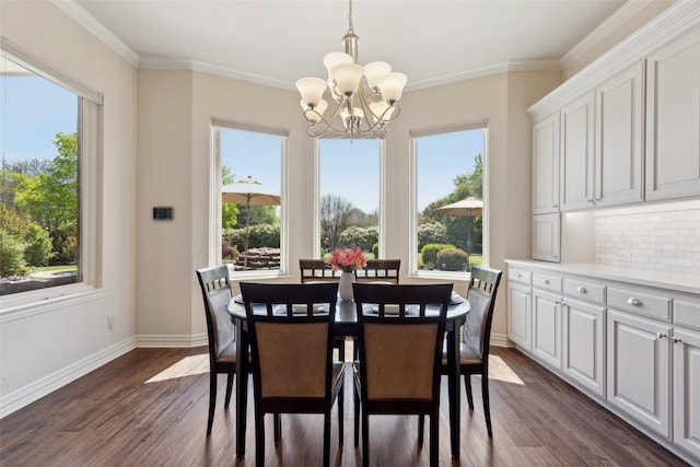 5205 Coral Springs Dr, Flower Mound, TX 75022 - dining area with a chandelier, healthy amount of natural light, dark wood-type flooring, and crown molding