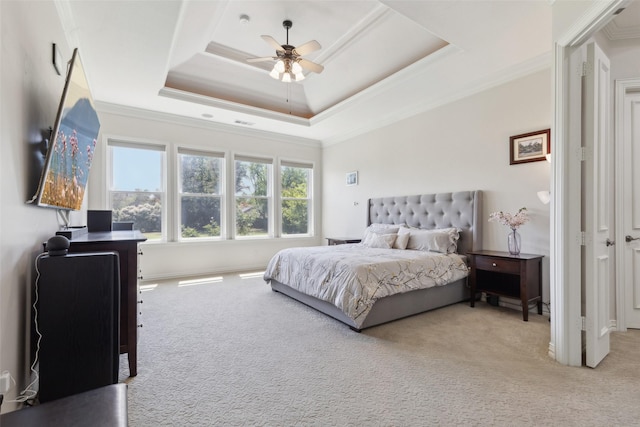5205 Coral Springs Dr, Flower Mound, TX 75022 - carpeted bedroom with crown molding, a ceiling fan, and a tray ceiling