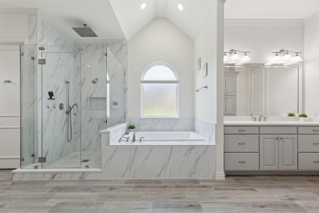 5205 Coral Springs Dr, Flower Mound, TX 75022 - full bathroom featuring a marble finish shower, a garden tub, vanity, lofted ceiling, and recessed lighting