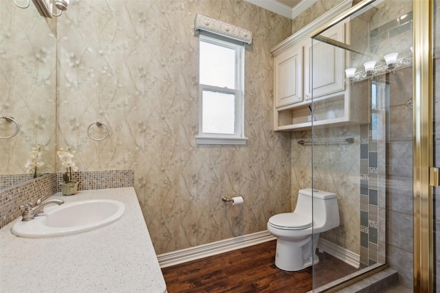 5205 Coral Springs Dr, Flower Mound, TX 75022 - full bath with toilet, wood finished floors, a shower stall, crown molding, and baseboards