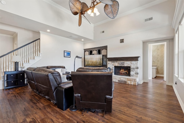 5205 Coral Springs Dr, Flower Mound, TX 75022 - living room with wood finished floors, stairway, a fireplace, ornamental molding, and baseboards
