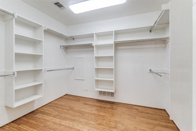4401 Roseland Ave Unit A, Dallas, TX 75204 - spacious closet featuring visible vents and wood finished floors