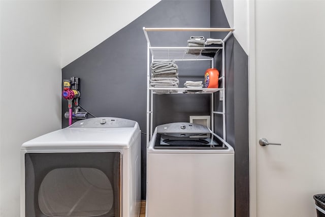 4401 Roseland Ave Unit A, Dallas, TX 75204 - laundry room featuring laundry area and washer and clothes dryer