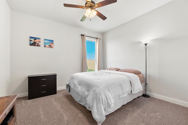 bedroom featuring baseboards, a ceiling fan, and carpet floors