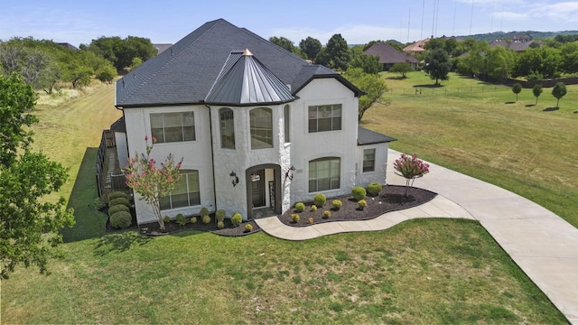 847 Bentwater Pkwy, Grand Prairie, TX 75104 - french country home with stucco siding, a front yard, and stone siding