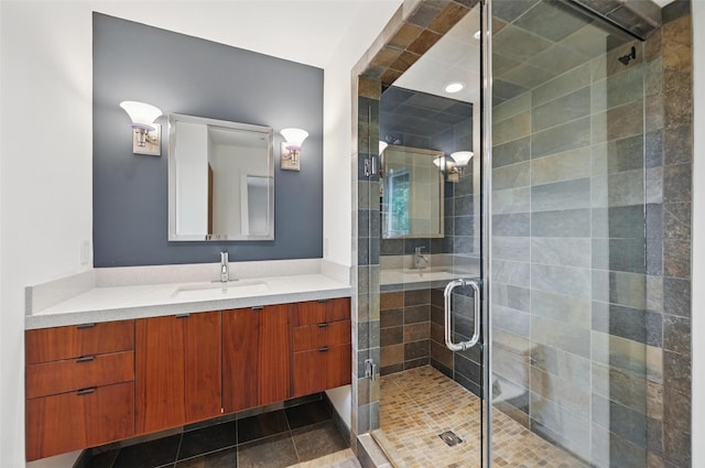 full bath featuring a shower stall and vanity