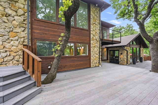 wooden terrace featuring french doors