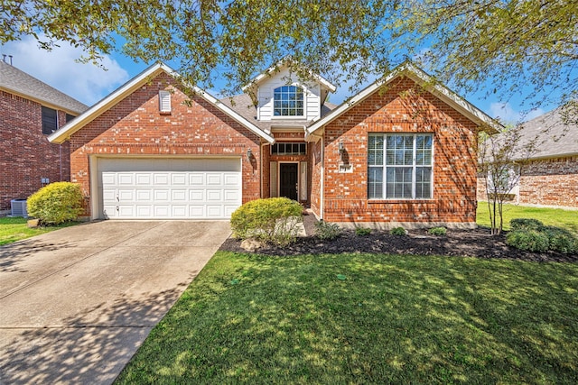 traditional-style home featuring brick siding, a front lawn, a garage, and driveway