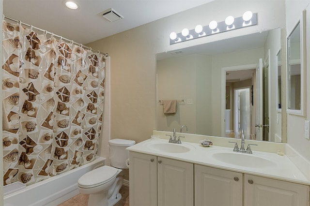 232 Wilshire Dr, Coppell, TX 75019 - bathroom featuring visible vents, toilet, a sink, tile patterned floors, and double vanity