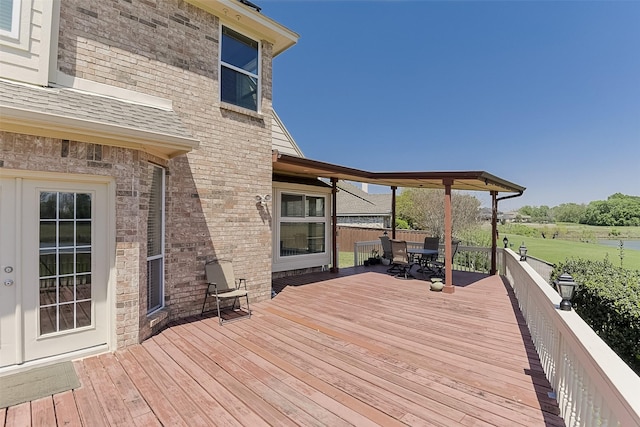 232 Wilshire Dr, Coppell, TX 75019 - wooden deck featuring outdoor dining area