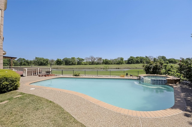 232 Wilshire Dr, Coppell, TX 75019 - view of pool featuring a patio, a fenced backyard, a pool with connected hot tub, and a lawn