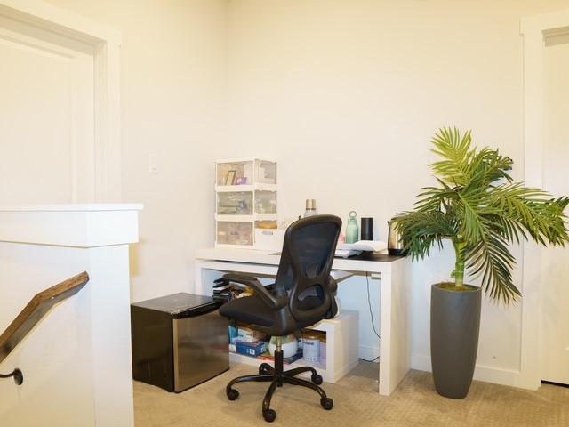 office space with light carpet